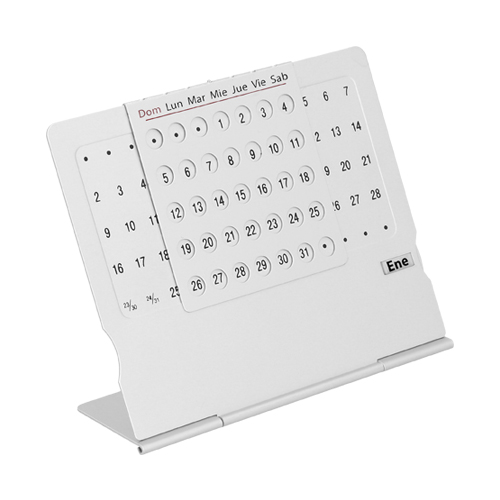 O-077, Mini calendario con base, rejilla movible y ruleta de aluminio para modificar los días y meses del año.